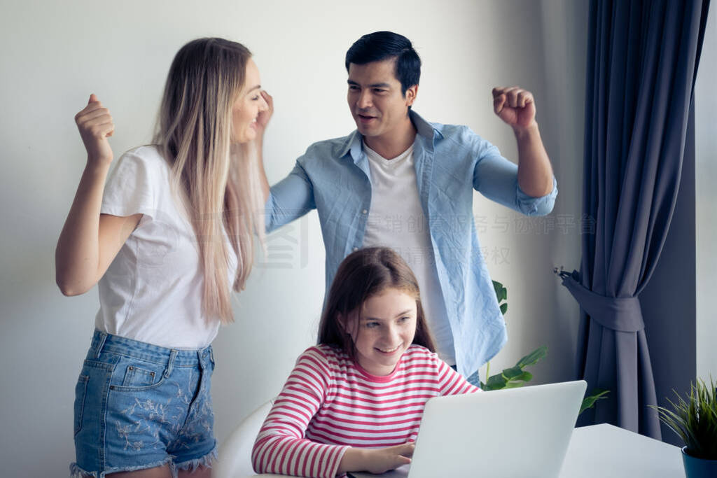 little girl using laptop computer and get winning prize, mother