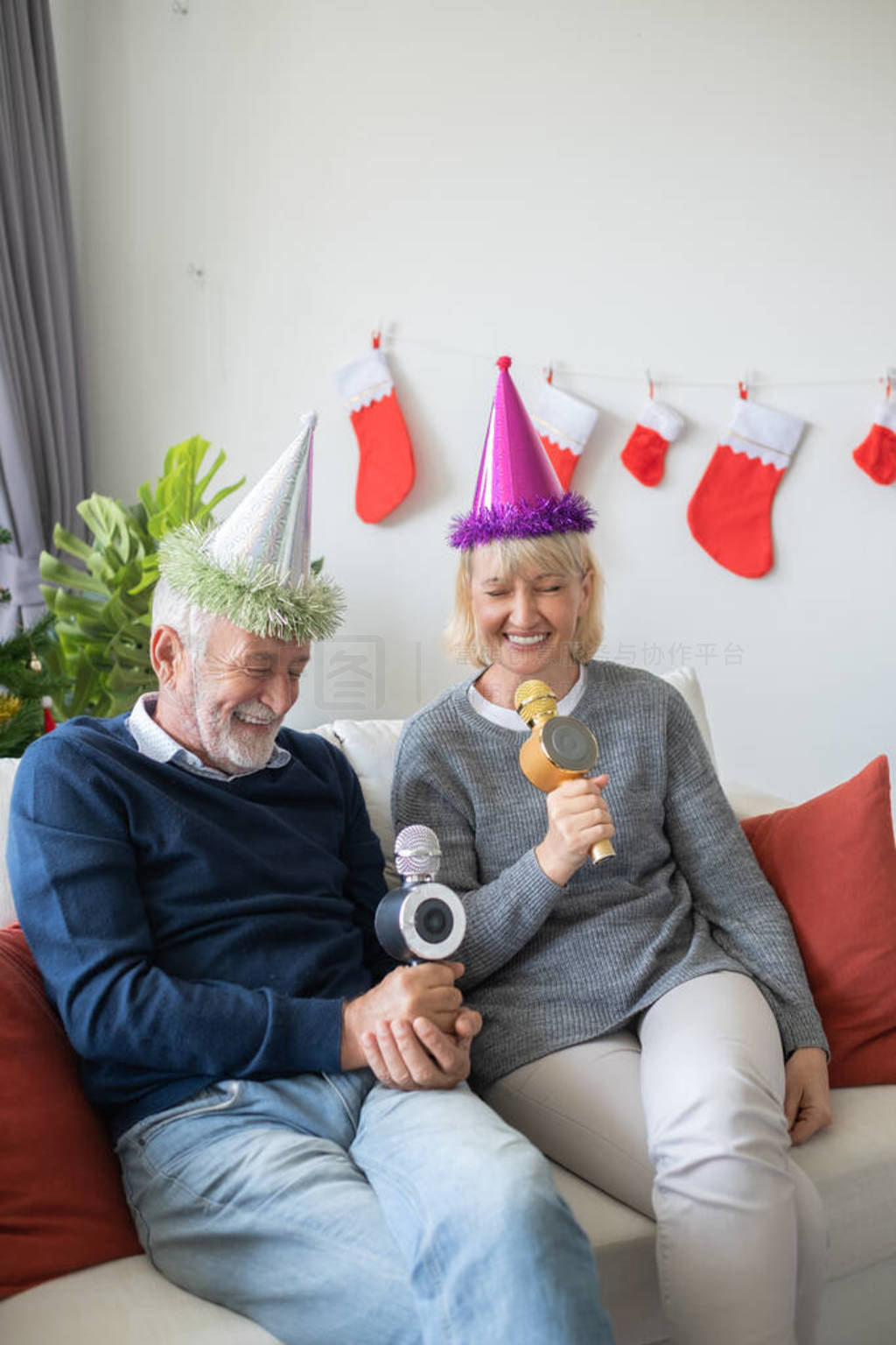 senior elderly caucasian old man and woman happy to sing a song