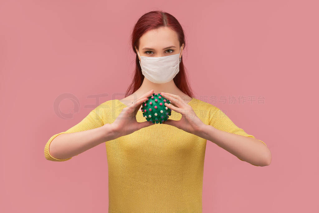 Young girl wears protective mask against virus