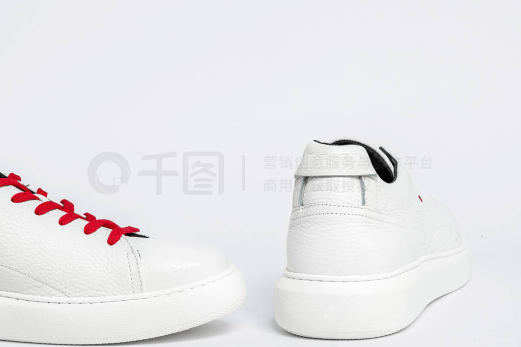 Mens sport shoes, close up. New white sneakers