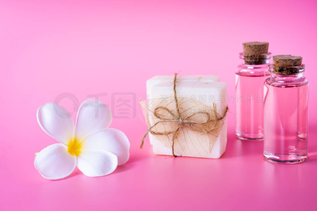 Spa wellness with milk soap,rose oil bottle and beautiful white