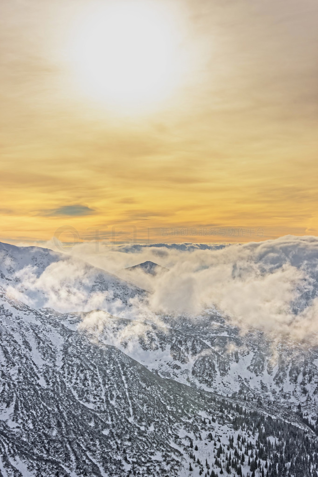 Cloud and sun in Kasprowy Wierch of Zakopane in Tatras in winter