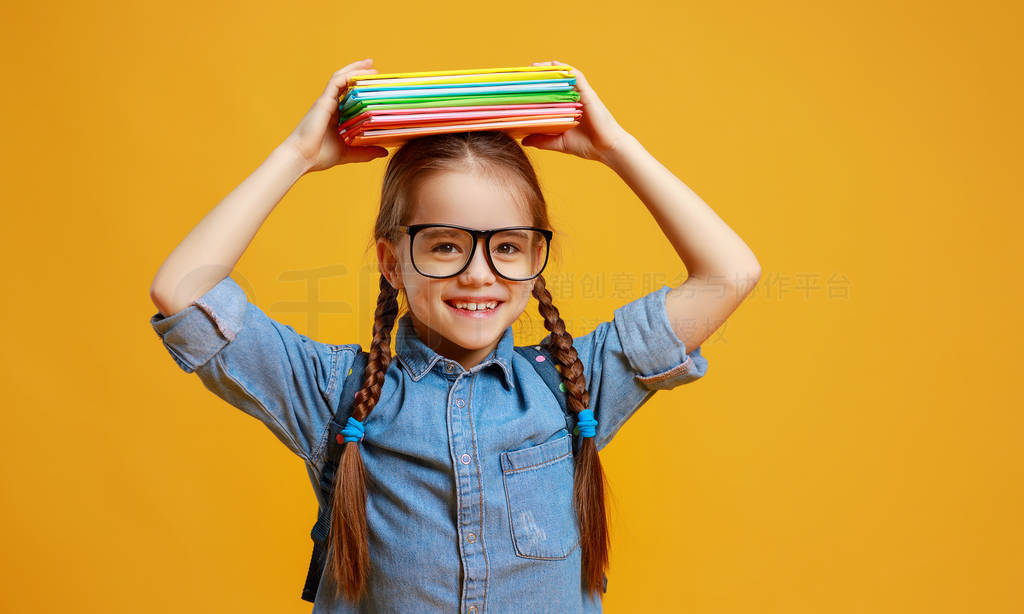 funny child school girl girl on yellow background