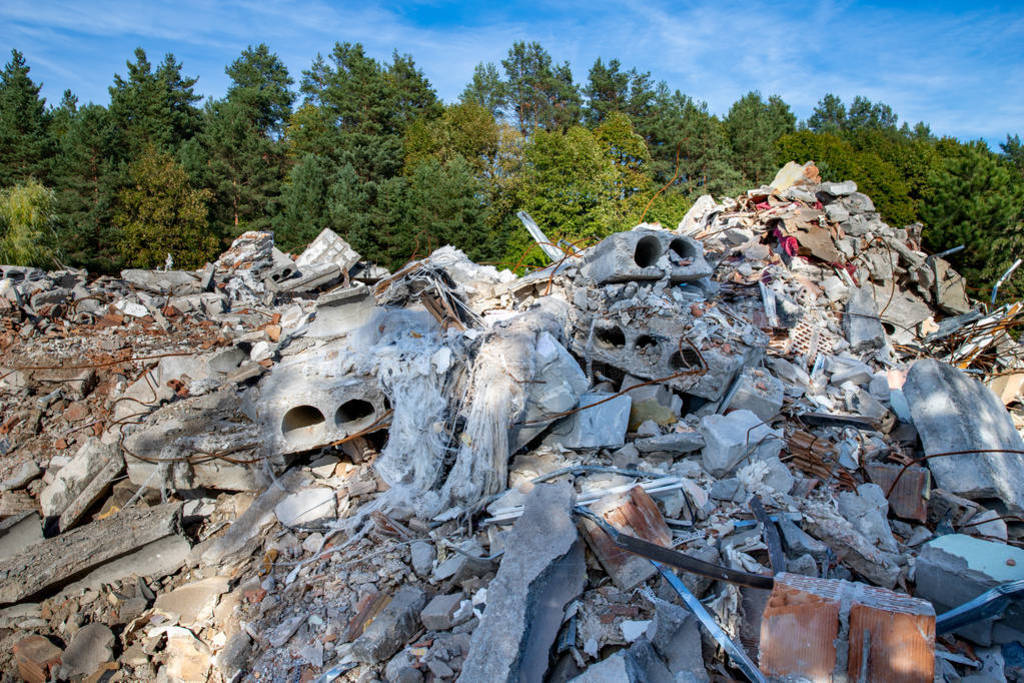 Pile of debris at the demolition of commercial buildings in the