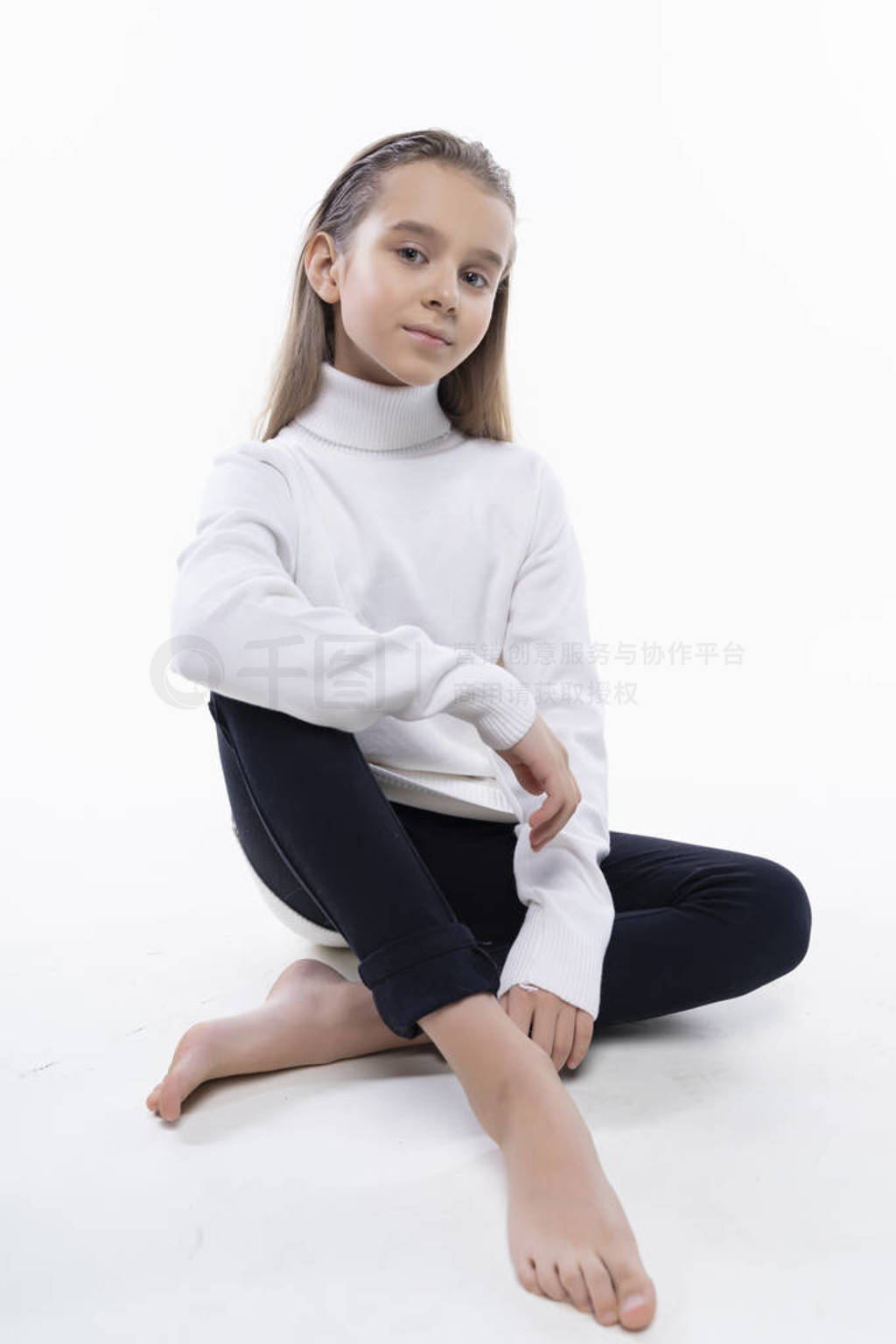 Beautiful cute teen girl wearing a white turtleneck sweater and