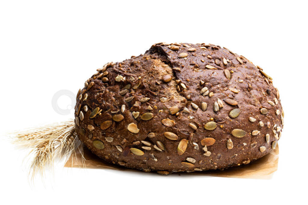 Wholemeal rye bread with sunflower and pumpkin seeds isolated on
