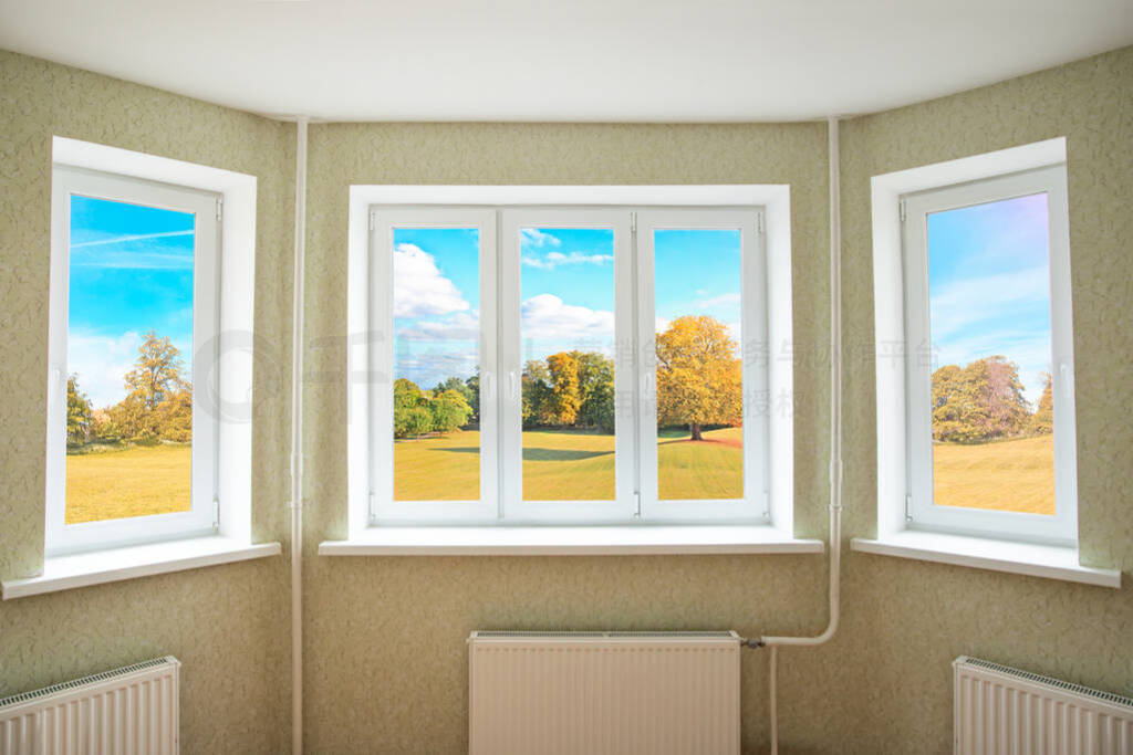 View through a modern PVC window onto beautiful autumn landscape