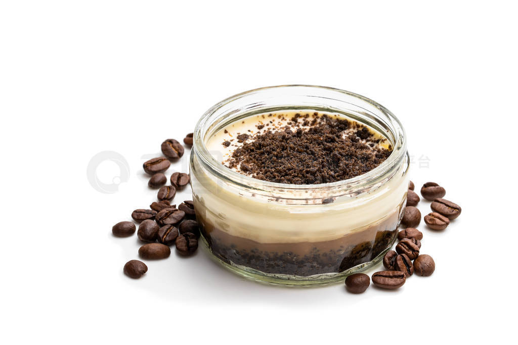 Layered creamy cappuccino cheesecakes in glass jar isolated on w