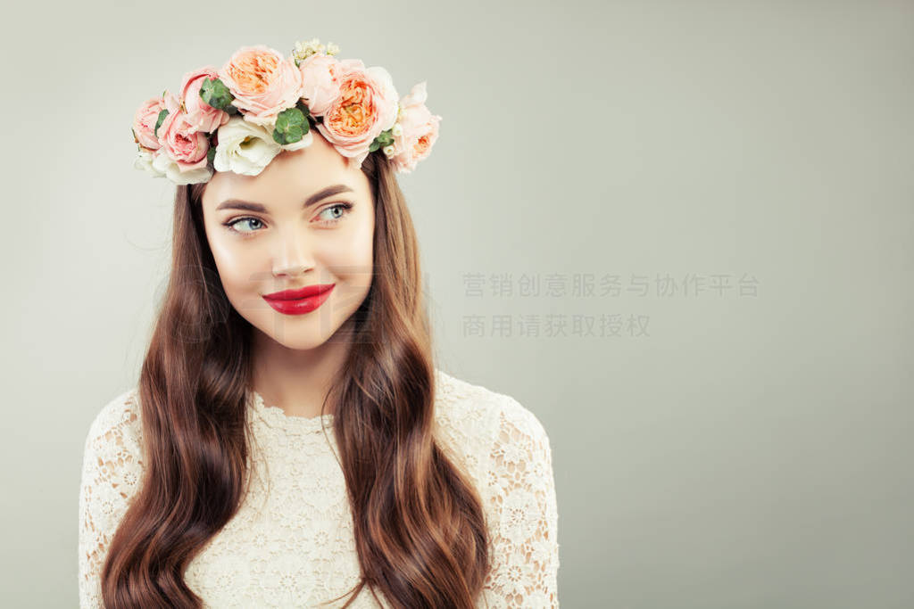 Model with Curly Hair, Makeup and Flowers.