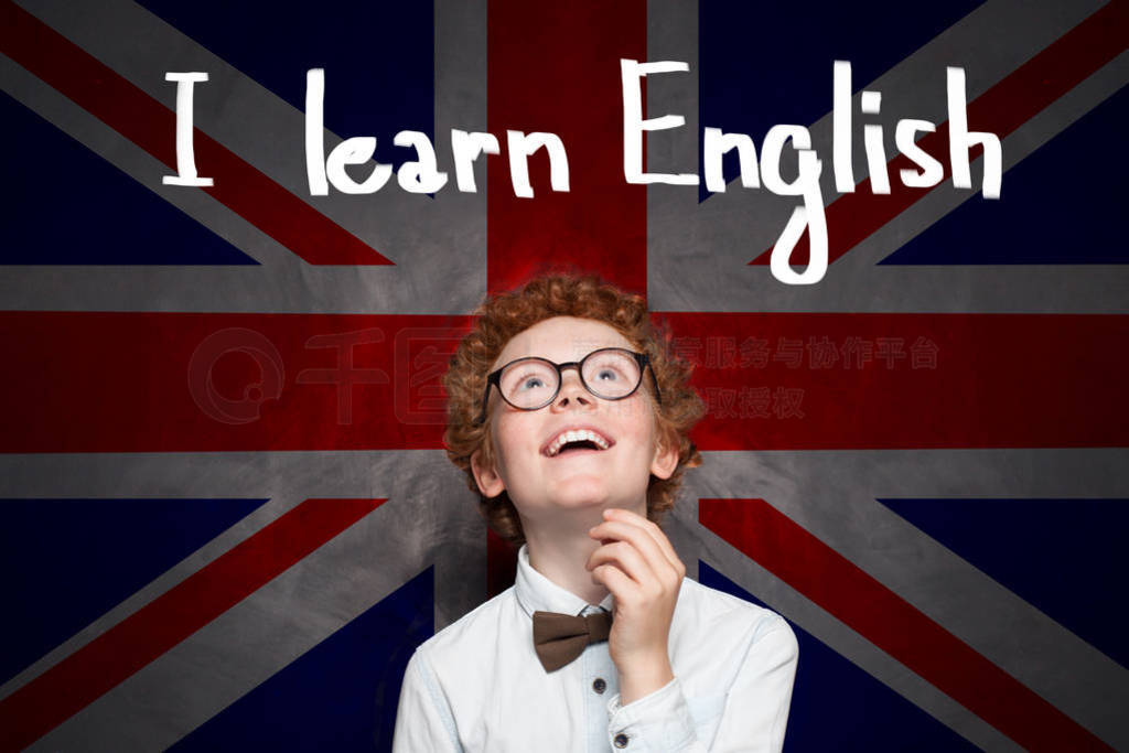 Little school boy with the UK flag background and Learn English