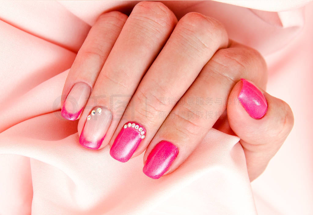 Woman's nails with beautiful manicure fashion design