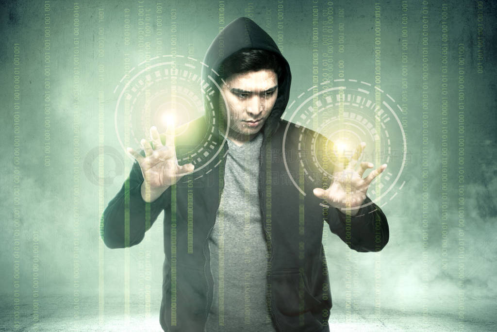 Young asian hacker in black hoodie touching virtual screen with