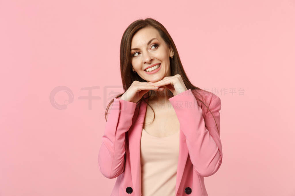 Portrait of smiling young woman wearing jacket put hand prop up