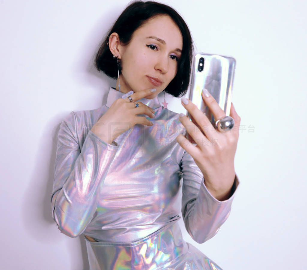 girl in trendy holographic space suit