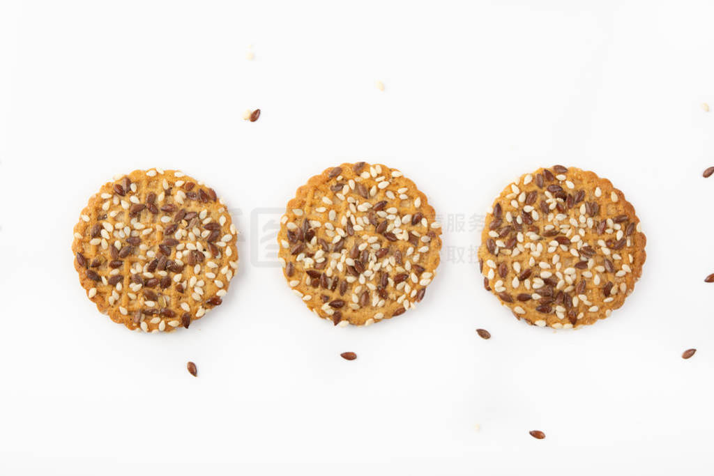 Concept of healthy nutrition: three fitness cookies with sesame