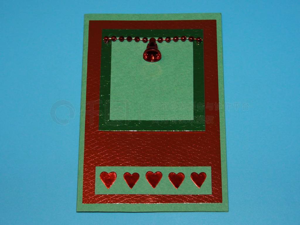 Christmas greeting card bell with heart red, blue, green, shiny