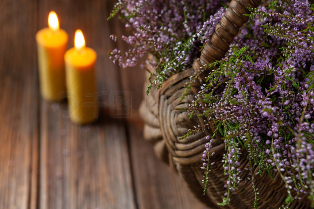 Beautiful fresh bouquet of blooming forest heather in basket