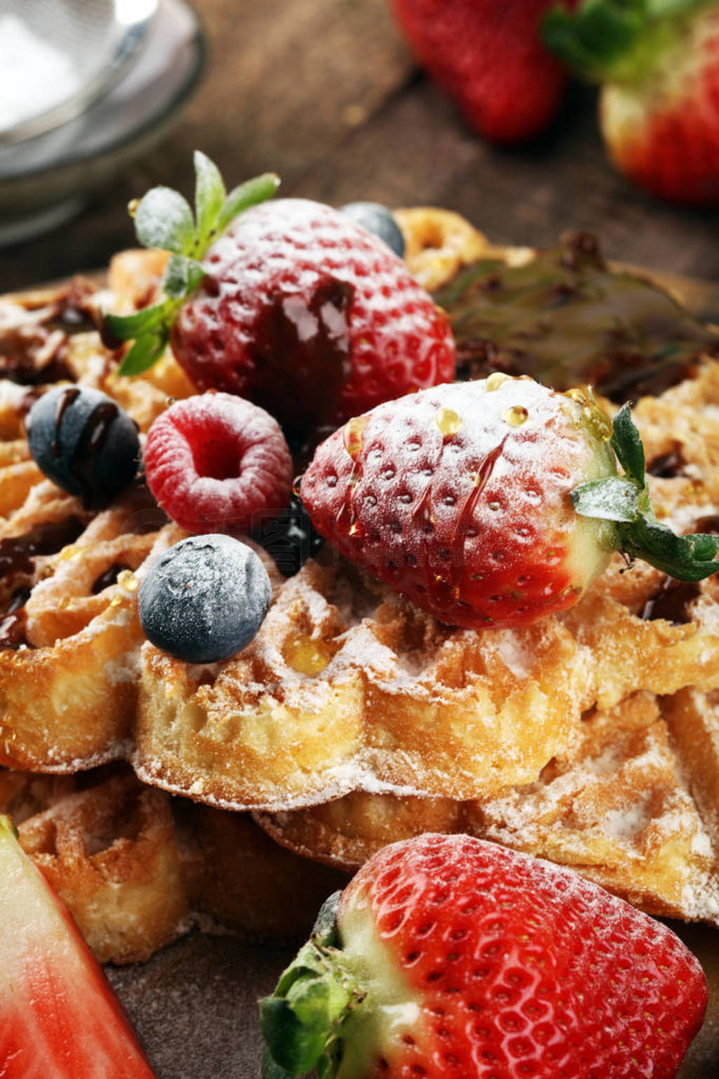 Waffle. Traditional belgian waffles with fresh fruit and powder