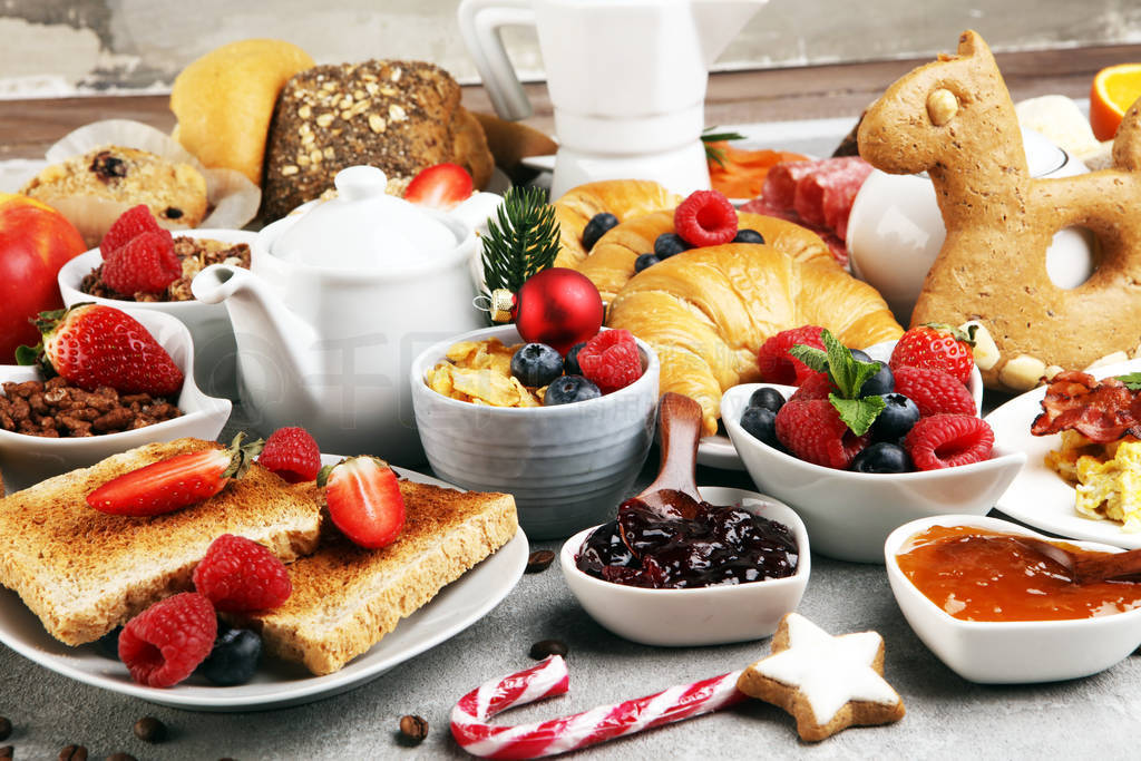 Breakfast served with coffee, orange juice, croissants, cereals