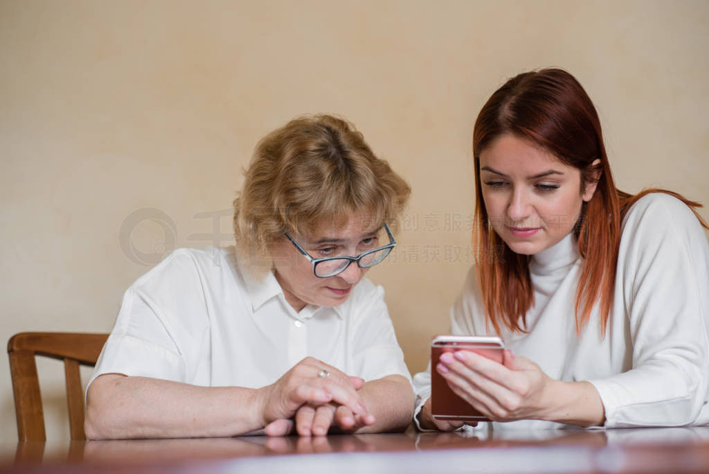 Indoor image of a beautiful red-haired young woman holding a mob