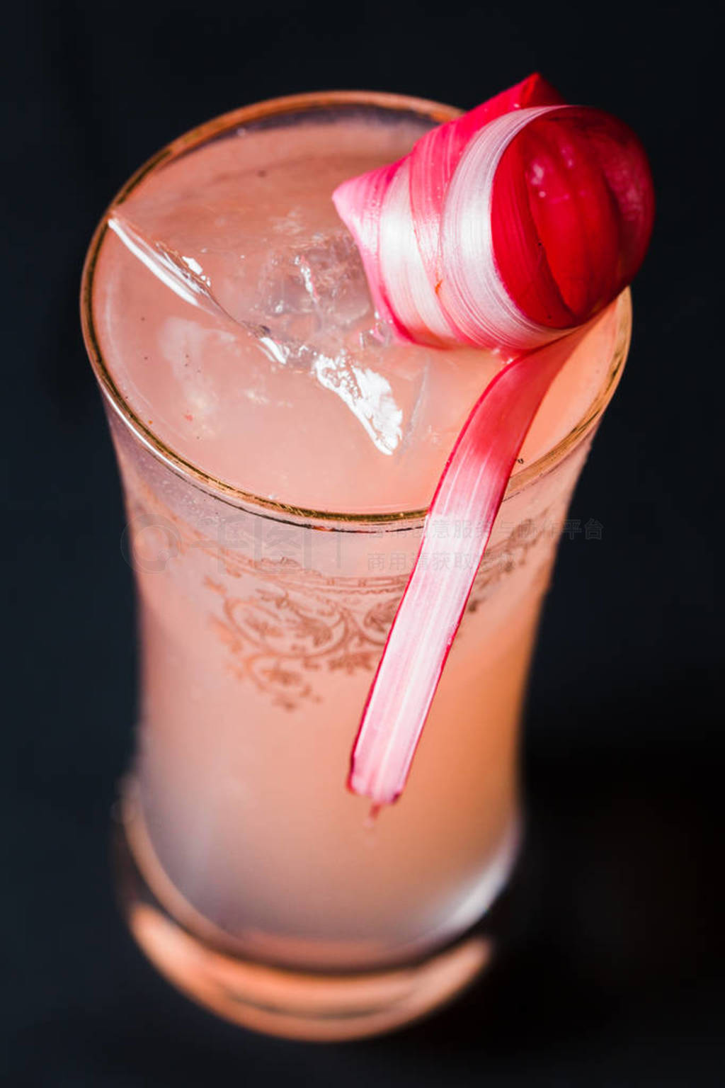 A handcrafted specialty alcoholic cocktail in a tall glass