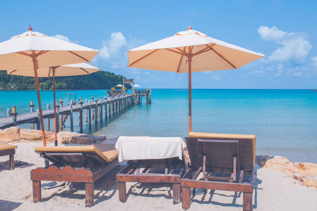 Beach chairs and wooden bridges on Ao Prao Beach, Ko Kood, Trat