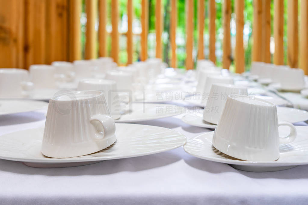 Emptry cup of tree arranged on table with wood barttens backgrou