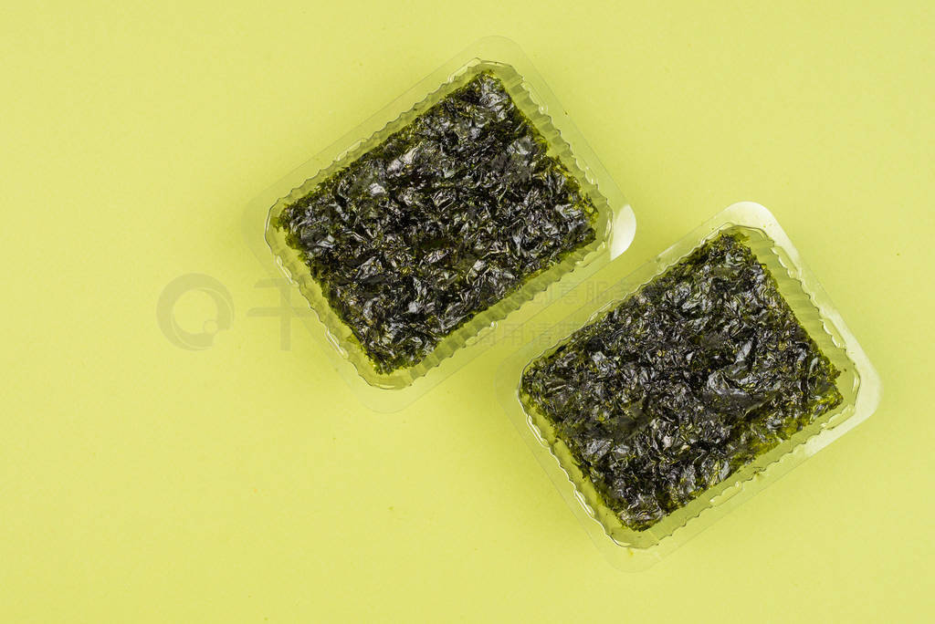 Nori seaweed on a green background.