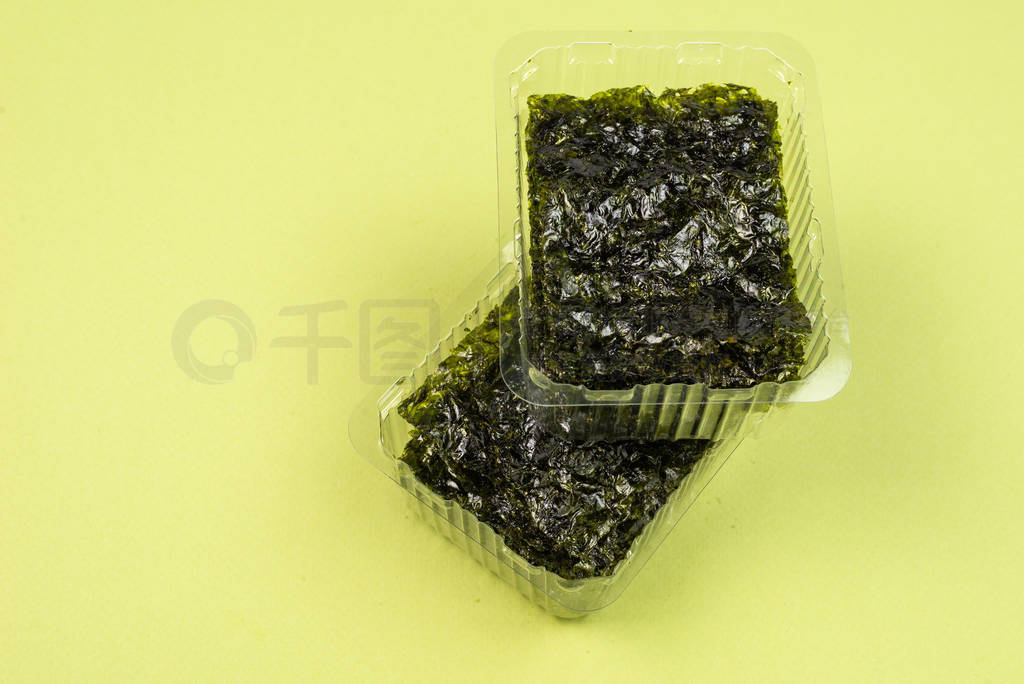 Nori seaweed on a green background.