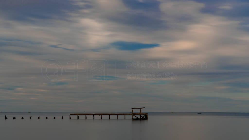 Dilapidated old fishing dock collapsing into the sea in Pak Nam