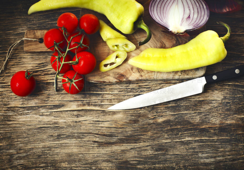 Raw organic vegetables for cooking on rustic wooden background,