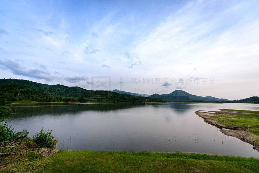 The landscape of nature with mountain, river, forest and clouds