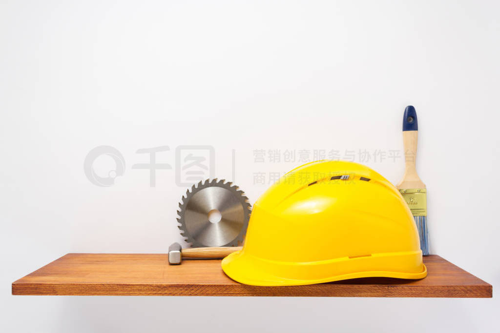 set of tools and instruments on shelf at white