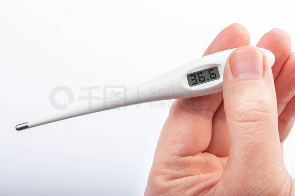 white electronic thermometer
