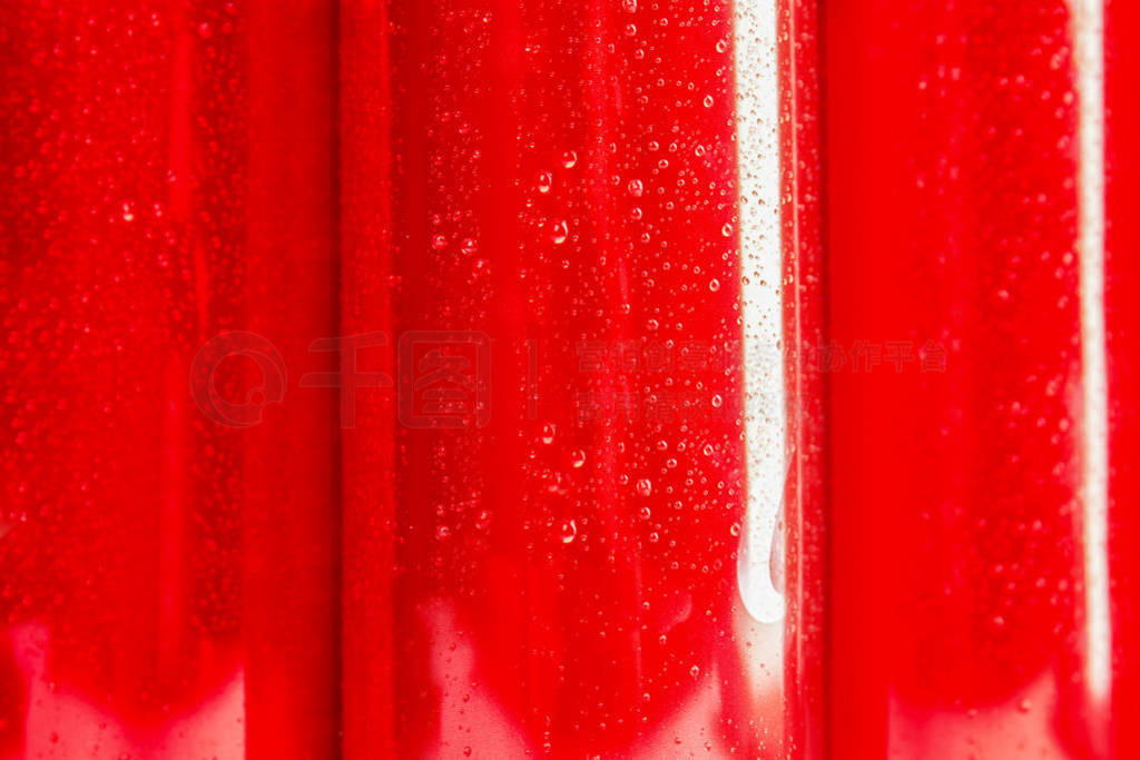 Blank metal red cans as background, closeup. Mock up for design