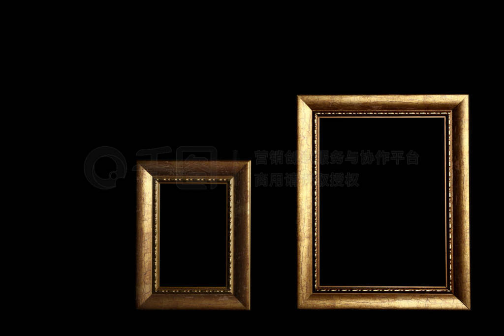 Empty golden frames on black background. Space for design