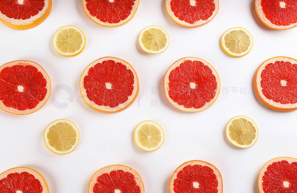 Flat lay composition with tasty ripe grapefruit slices on white