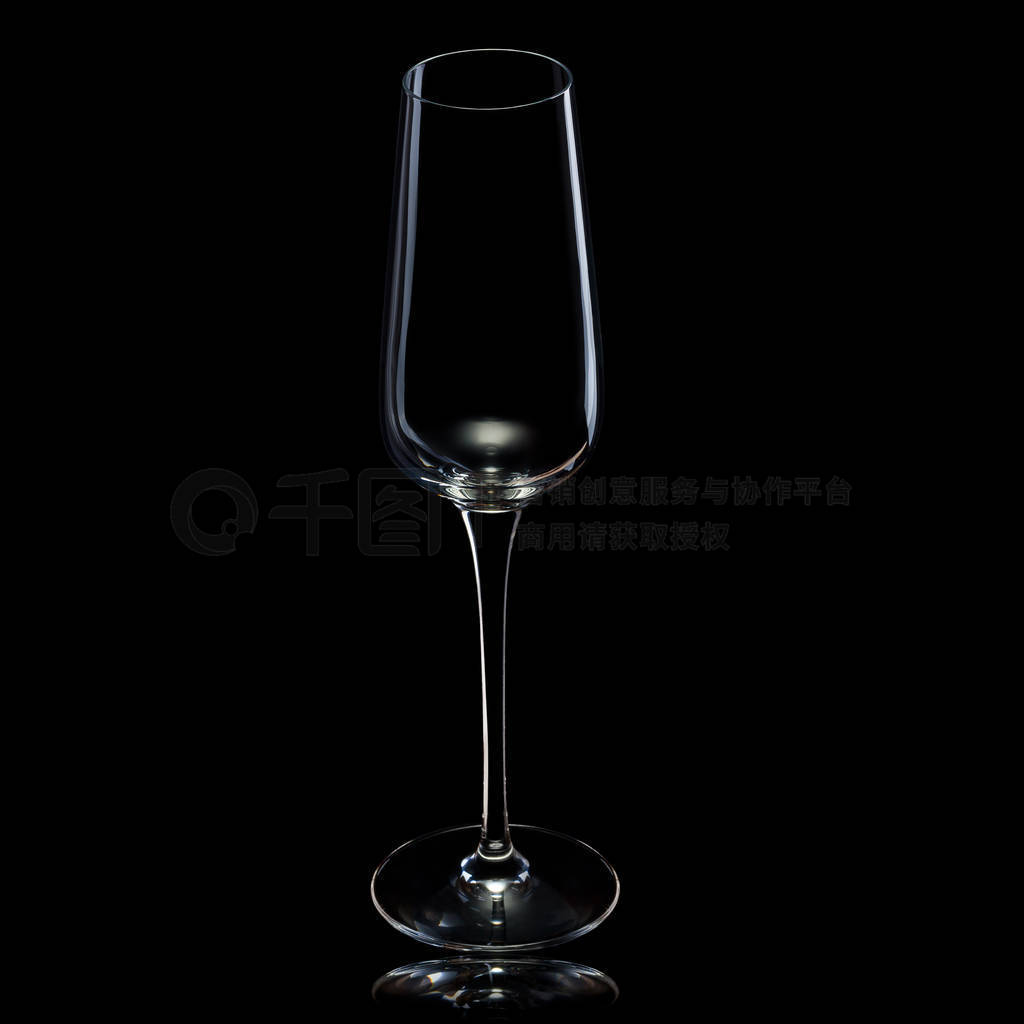 Empty luxury champagne glass isolated on a black background