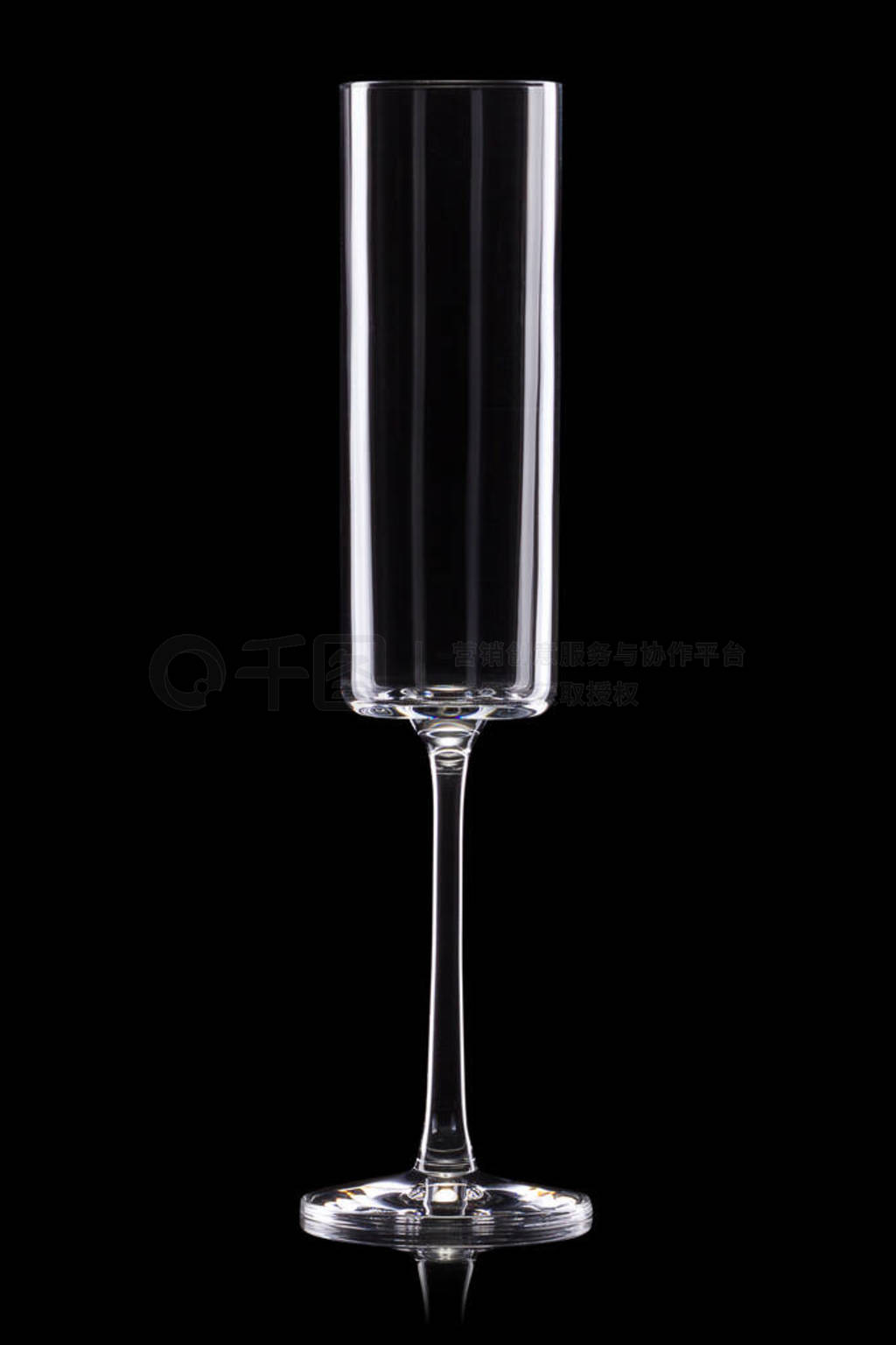 Empty luxury champagne glass isolated on a black background