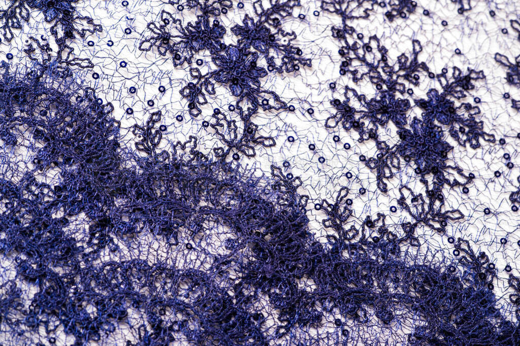Texture, pattern, lace blue on a white background. Delicate and