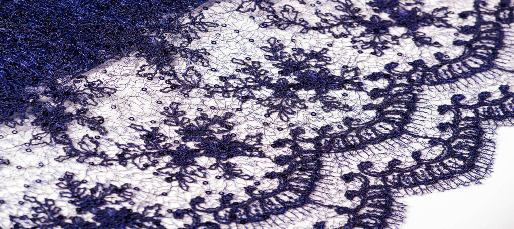Texture, pattern, lace blue on a white background. Delicate and