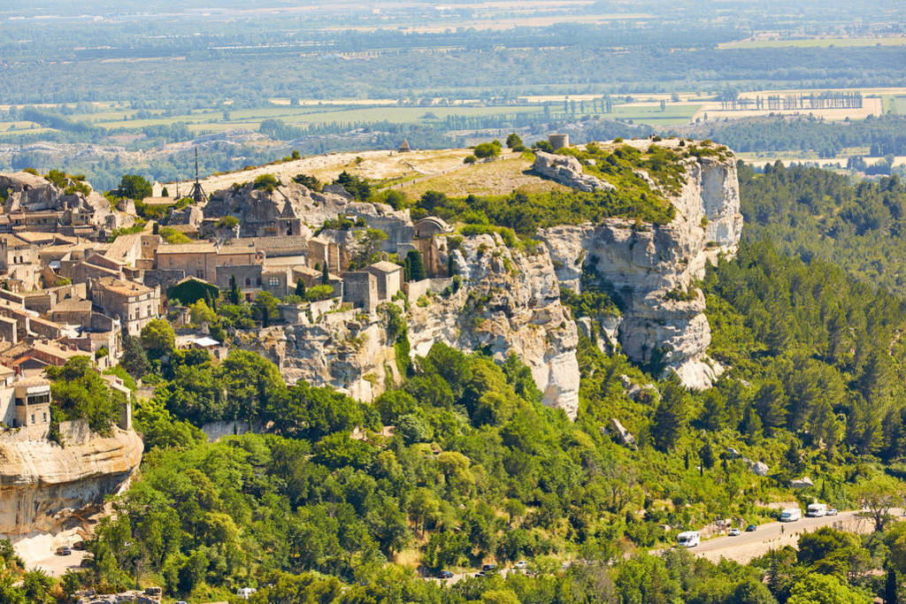 Provencal village Les Baux de Provence and view of Sarragan