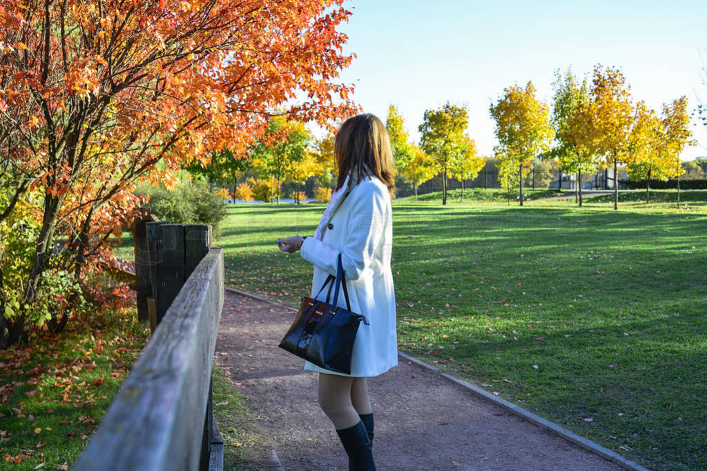 Autumn. Walk people in the autumn park.