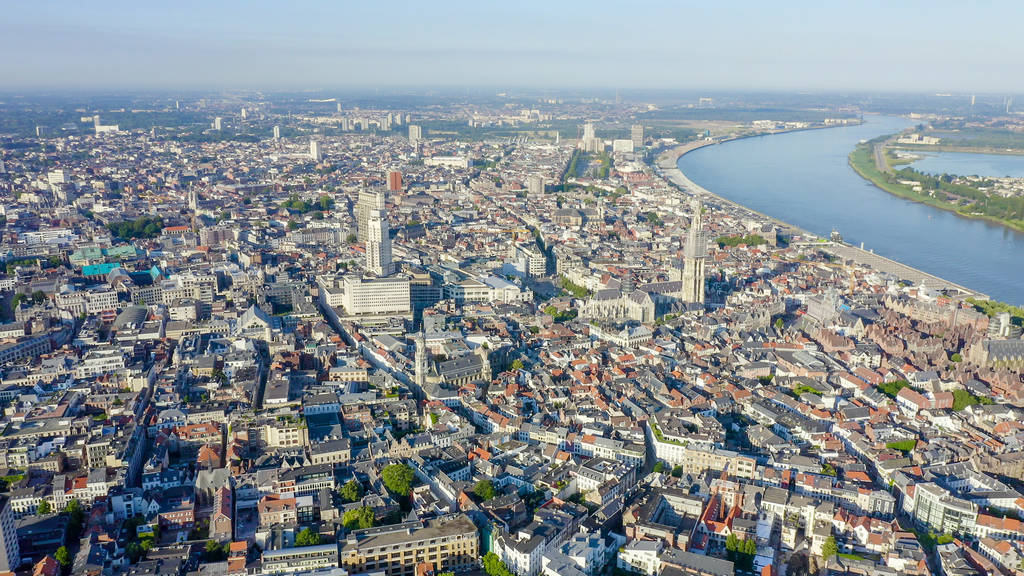 Antwerp, Belgium. Flying over the roofs of the historic city. Sc