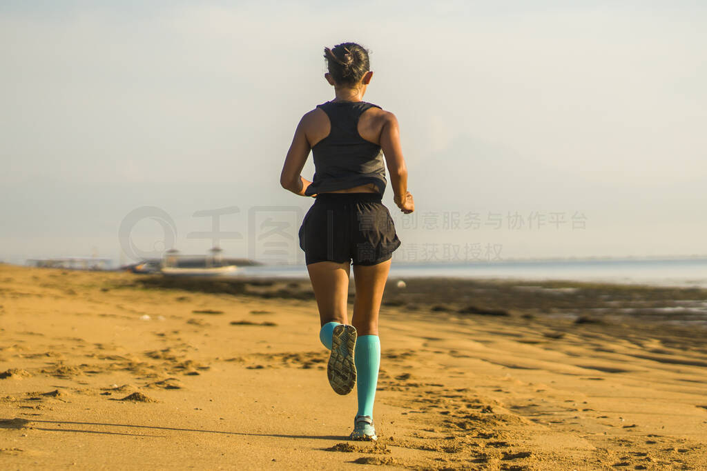 back view portrait of young attractive and athletic woman in co