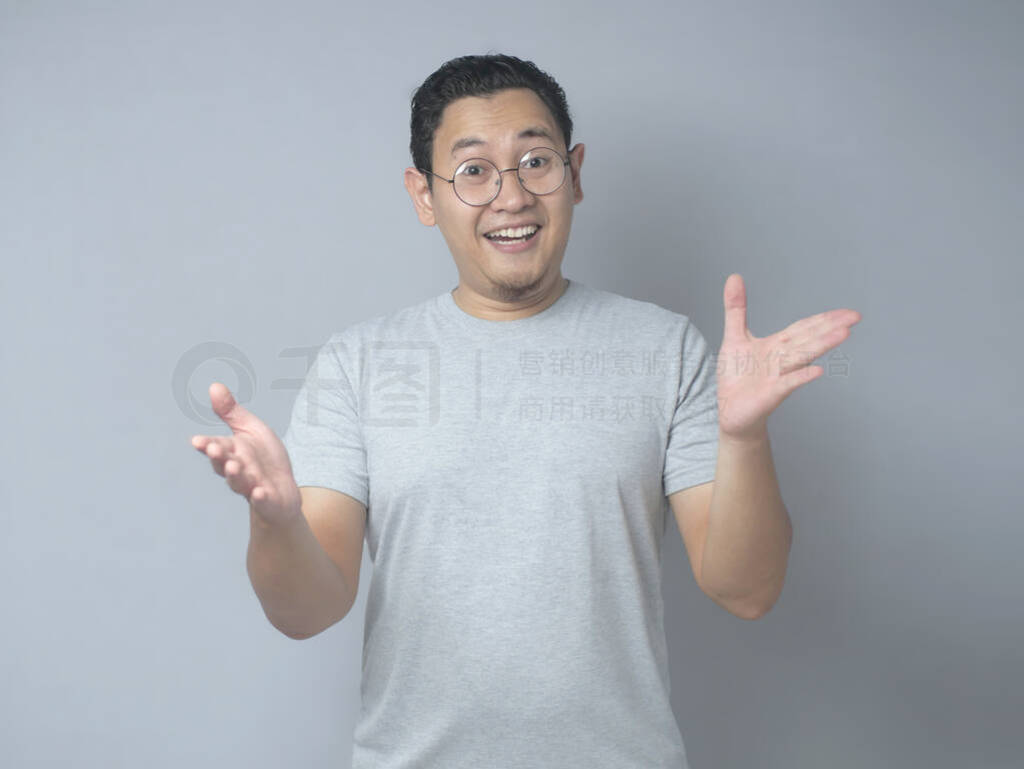 Asian Man Smiling With Open Arms