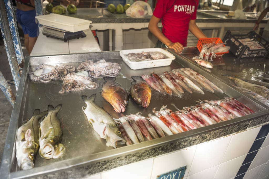 Fishermen sell fish. Copacabana Fort