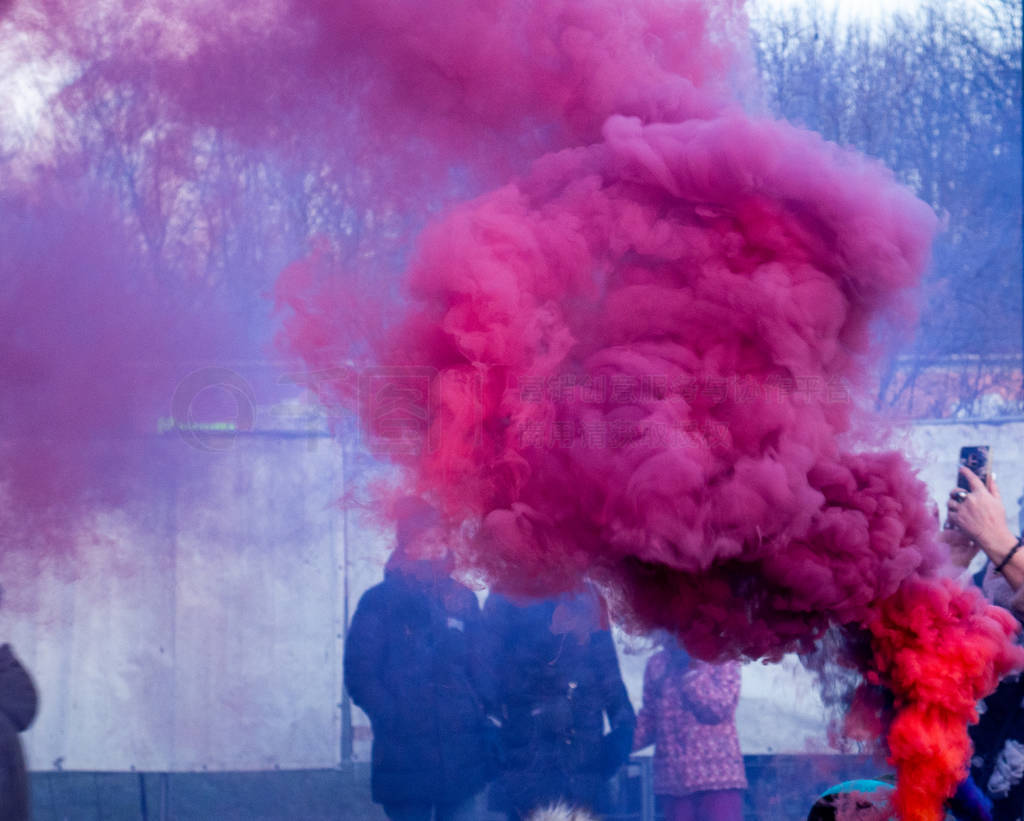 Colorful smoke from a smoke bomb.