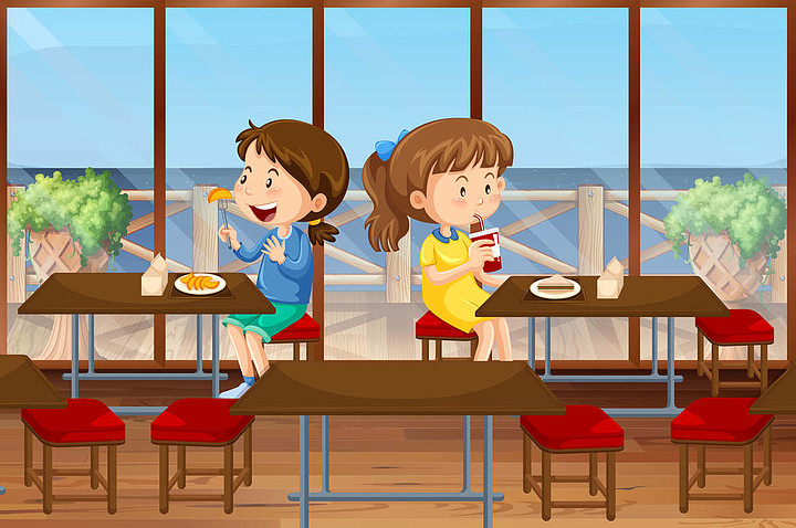 两个女孩在食堂吃饭