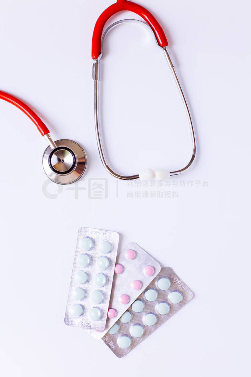 stethoscope for doctor checkup with pills on medical laboratory